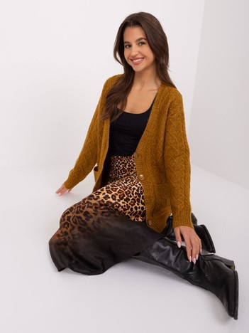 Ciemnożółty damski sweter rozpinany w warkocze