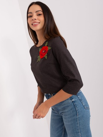 Czarna krótka bluzka wizytowa z kwiatem