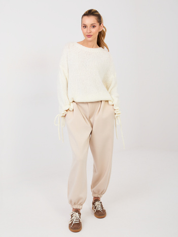 Jasnobeżowe dresowe spodnie ze ściągaczami