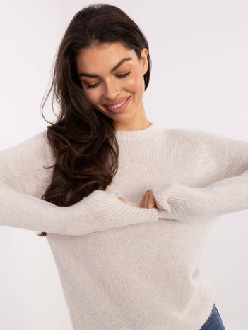 Jasnobeżowy sweter w jednolitym kolorze