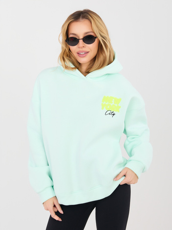 Miętowa dresowa bluza z naszywkami