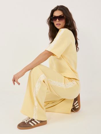 Jasnożółte dresowe spodnie wide leg od kompletu