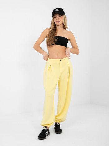Jasnożółte dresowe spodnie ze ściągaczami