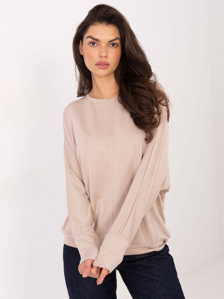 Beżowa bluzka oversize z naszywką