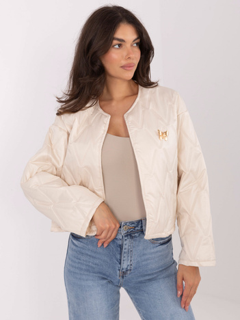 Jasnobeżowa damska kurtka z broszką RUE PARIS