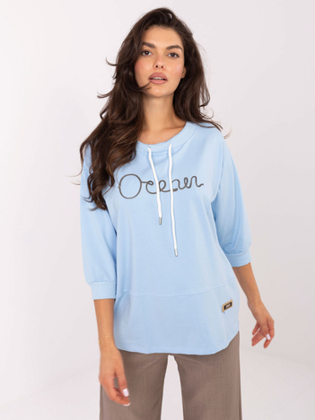 Jasnoniebieska damska bluzka z troczkami