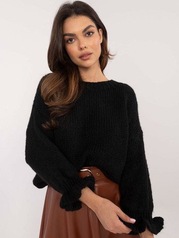 Czarny sweter oversize z falbankami przy rękawach