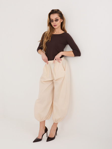 Jasnobeżowe luźne spodnie parachute RUE PARIS