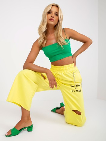 Żółte damskie spodnie dresowe z szeroką nogawką