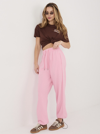 Różowe dresowe spodnie ze ściągaczami