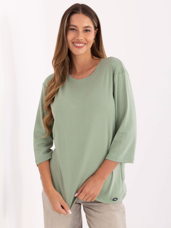 Pistacjowa damska bluzka w jednolitym kolorze