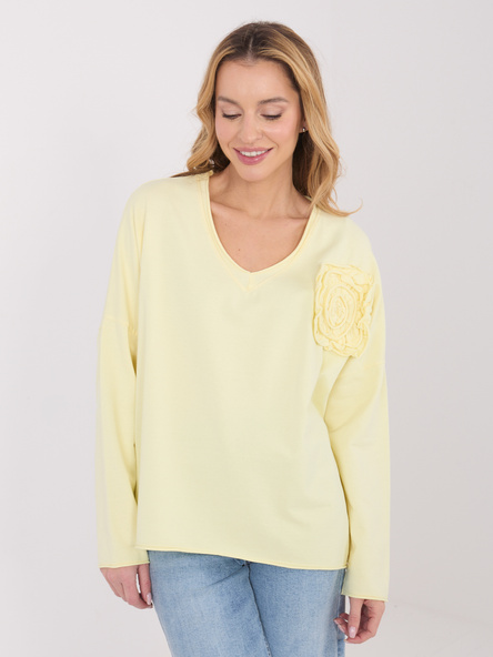 Jasnożółta bluzka oversize z długim rękawem