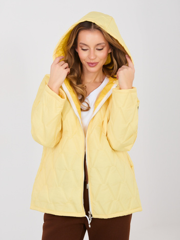 Pastelowa żółta pikowana kurtka z suwakiem