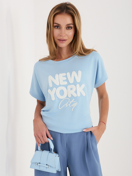 Jasnoniebieska bluzka z napisem New York RUE PARIS