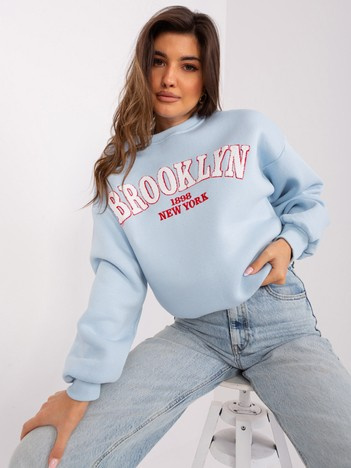 Jasnoniebieska ocieplana bluza oversize z napisem