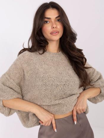 Beżowy sweter boucle o kroju oversize