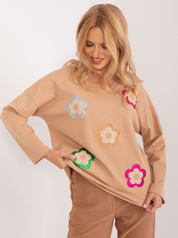 Beżowa casualowa bluzka z aplikacjami
