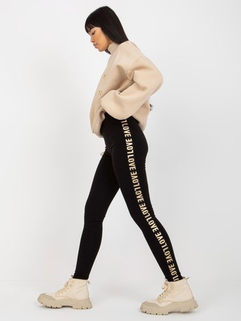 Czarne damskie legginsy casualowe z lampasami