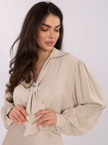 Beżowa elegancka bluzka z wiązaniem