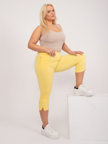 Jasnożółte materiałowe spodnie rybaczki plus size