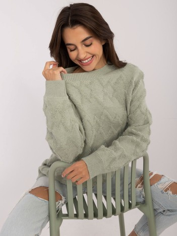 Pistacjowy sweter oversize we wzory