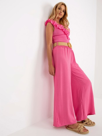 Różowe zwiewne spodnie z materiału z gumką w pasie