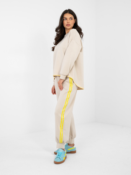 Jasnobeżowe damskie spodnie ze ściągaczami RUE PARIS