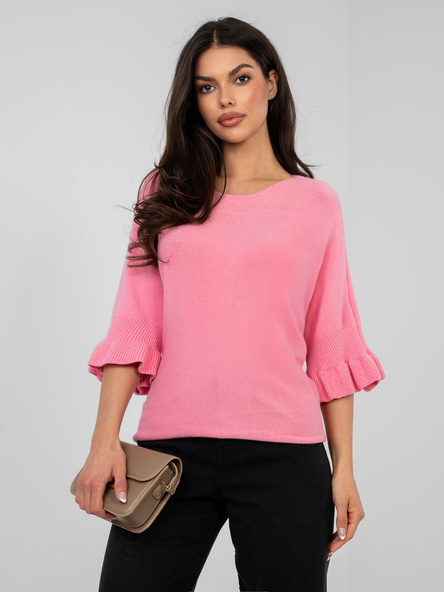 Pastelowy różowy sweter z rozkloszowanym rękawem