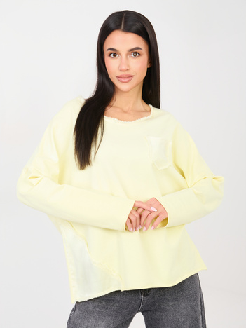 Jasnożółta bluzka z satynowanymi wstawkami