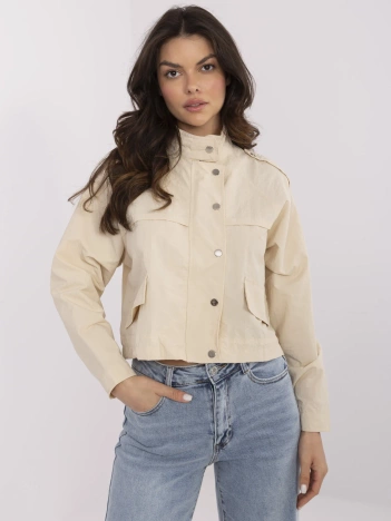 Beżowa kurtka wiatrówka z imitacją kieszeni