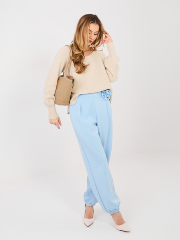 Pastelowe niebieskie dresowe spodnie bez zapięcia