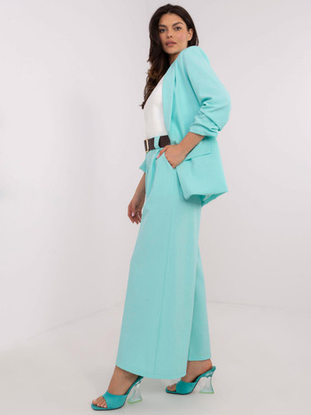 Miętowe garniturowe spodnie z kieszeniami