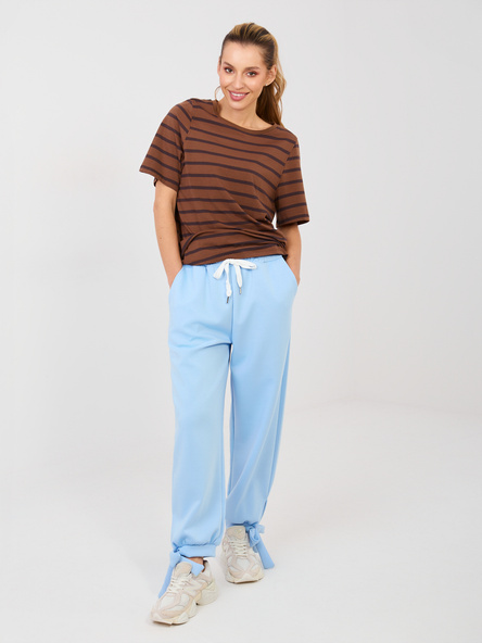 Jasnoniebieskie dresowe spodnie wiązane w kostce